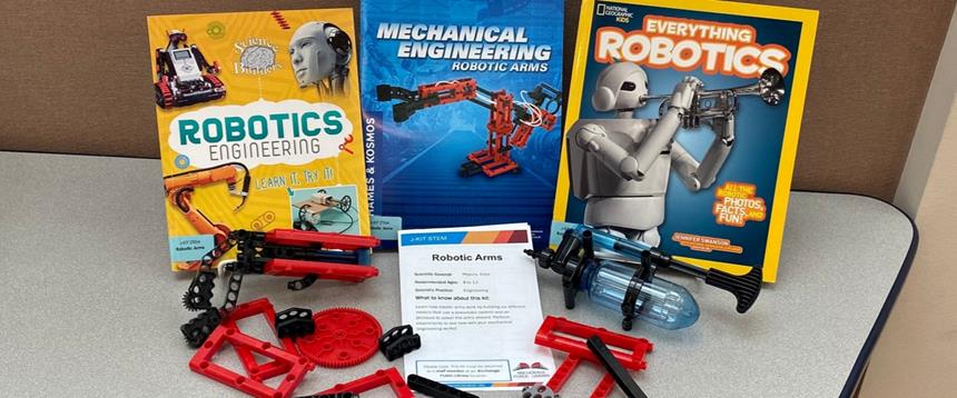 Books and plastic gear pieces included in robotic STEM Kit