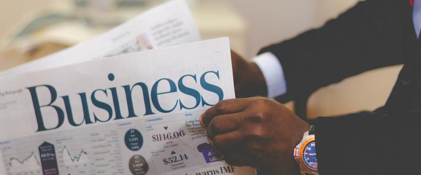 Man reading a business newspaper