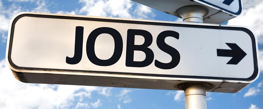 Directional street sign with the word "Jobs" and pointing arrow
